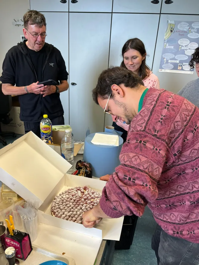 Isra cuts the birthday cake