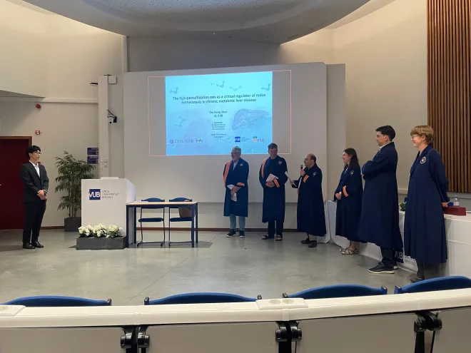 Shen gets two PhD degrees!